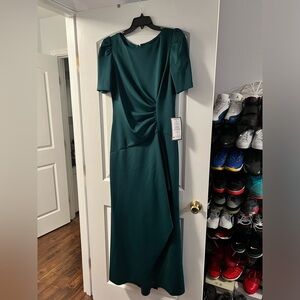 Hunter green ruched a-line gown great for a special occassion.